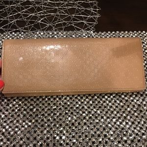 Aunthentic Gucci Clutch GG monogram.